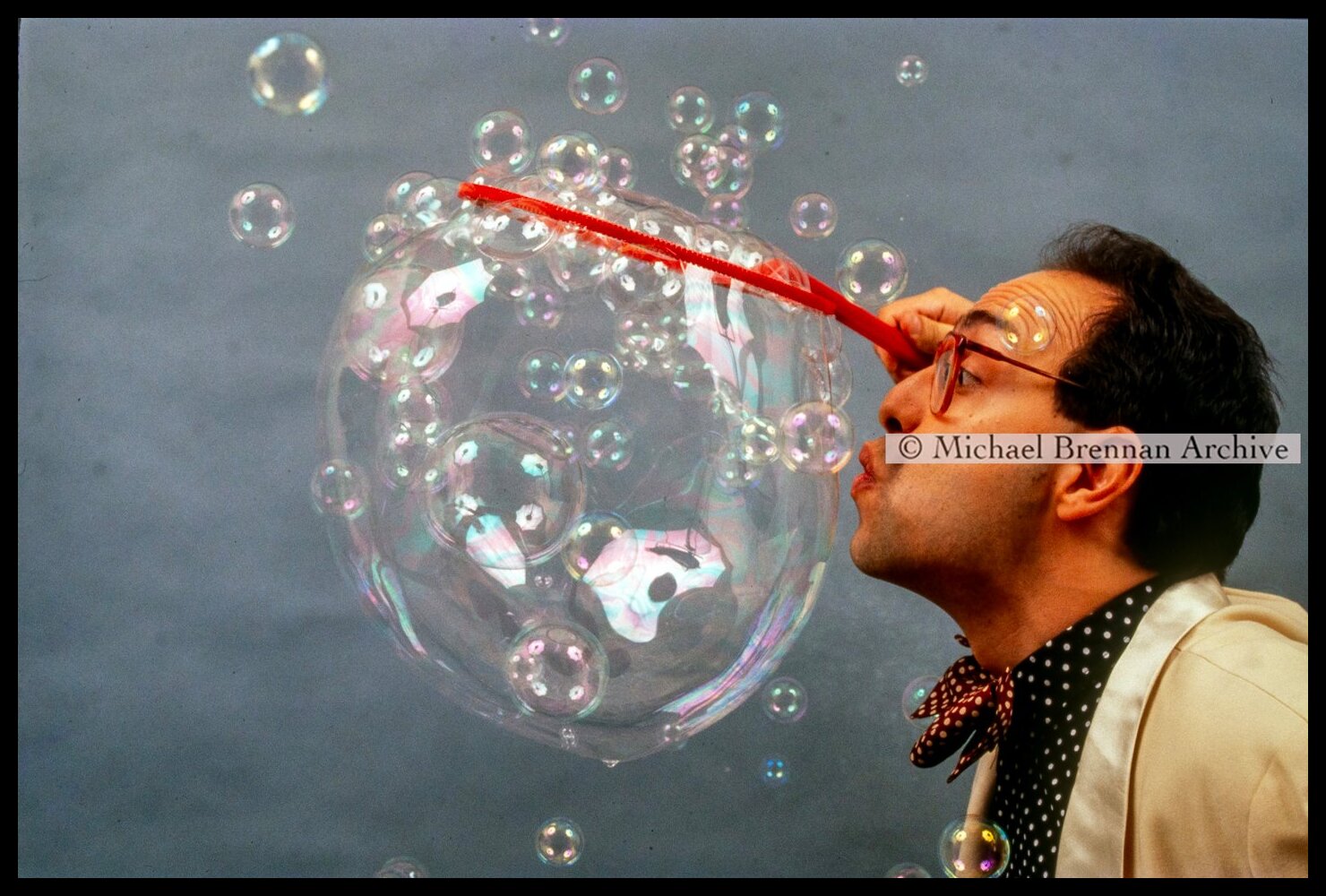 Balloonologist Demonstrating Skills — Manhattan, New York · 1997