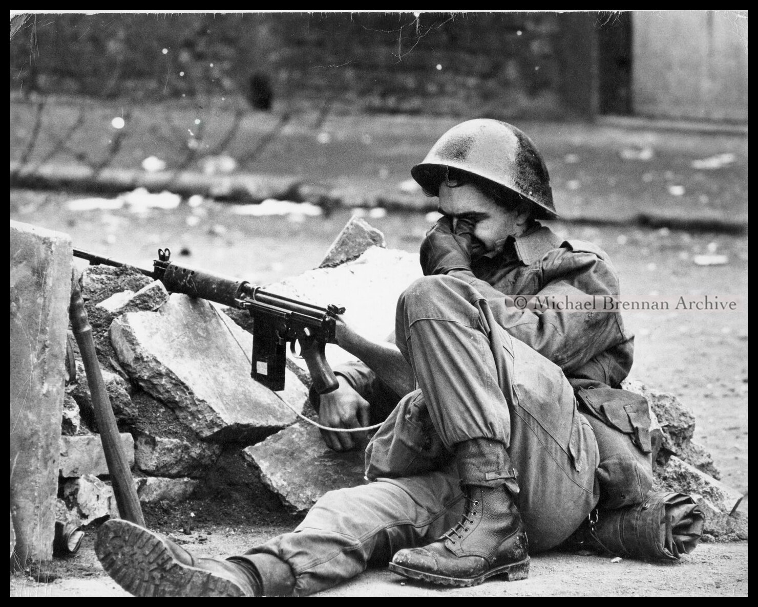 British Soldier Resting After Falls Road Curfew — Belfast, Northern Ireland · Jul 4, 1970