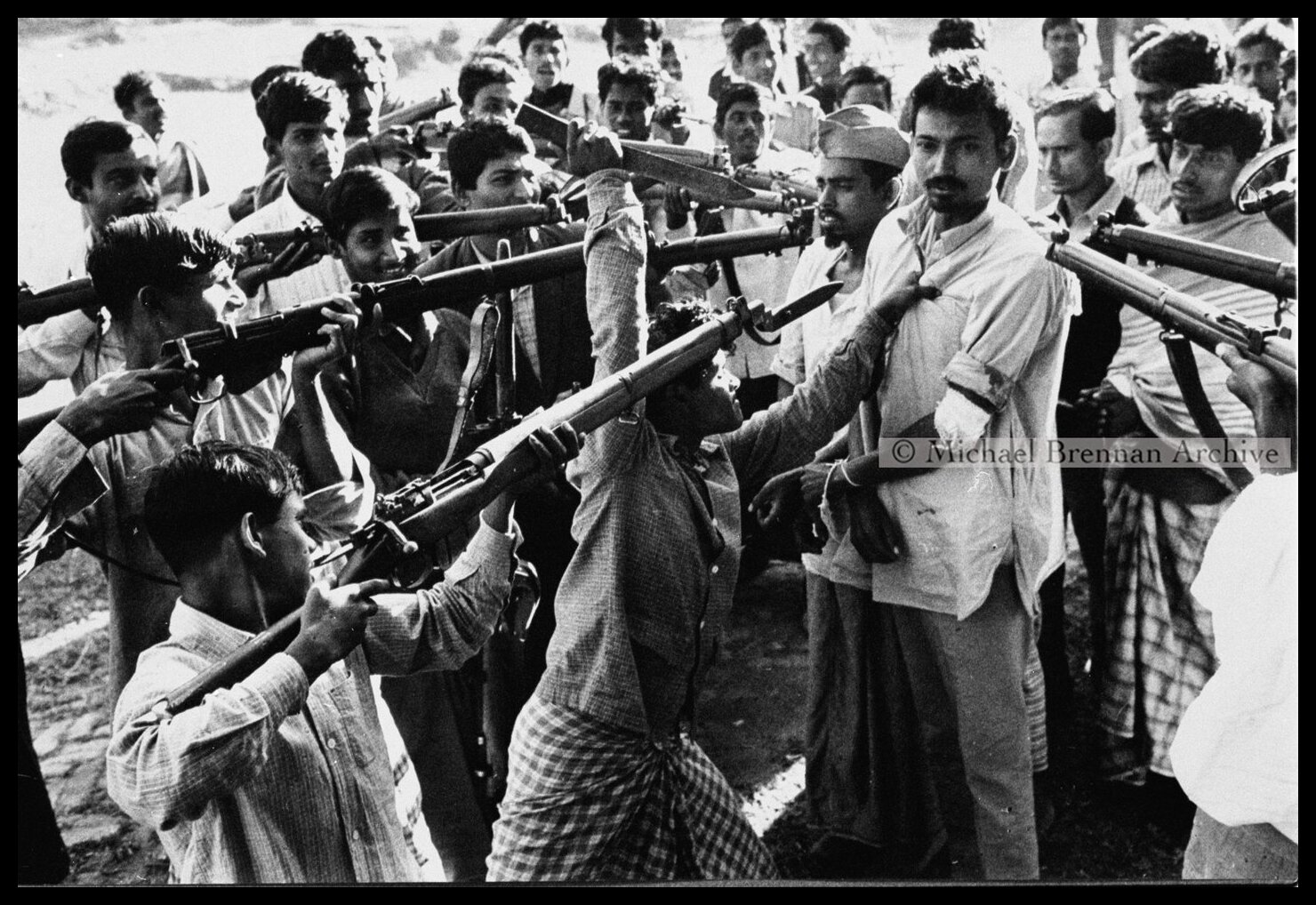 Public Execution of 'Razakars' by Local Villagers — Jessore, Bangladesh · Dec 1971