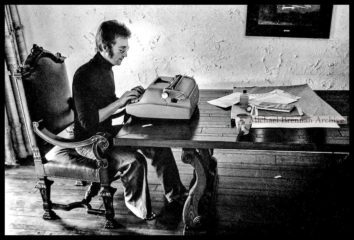 John Lennon at the Typewriter — Beverly Hills · Nov 1973