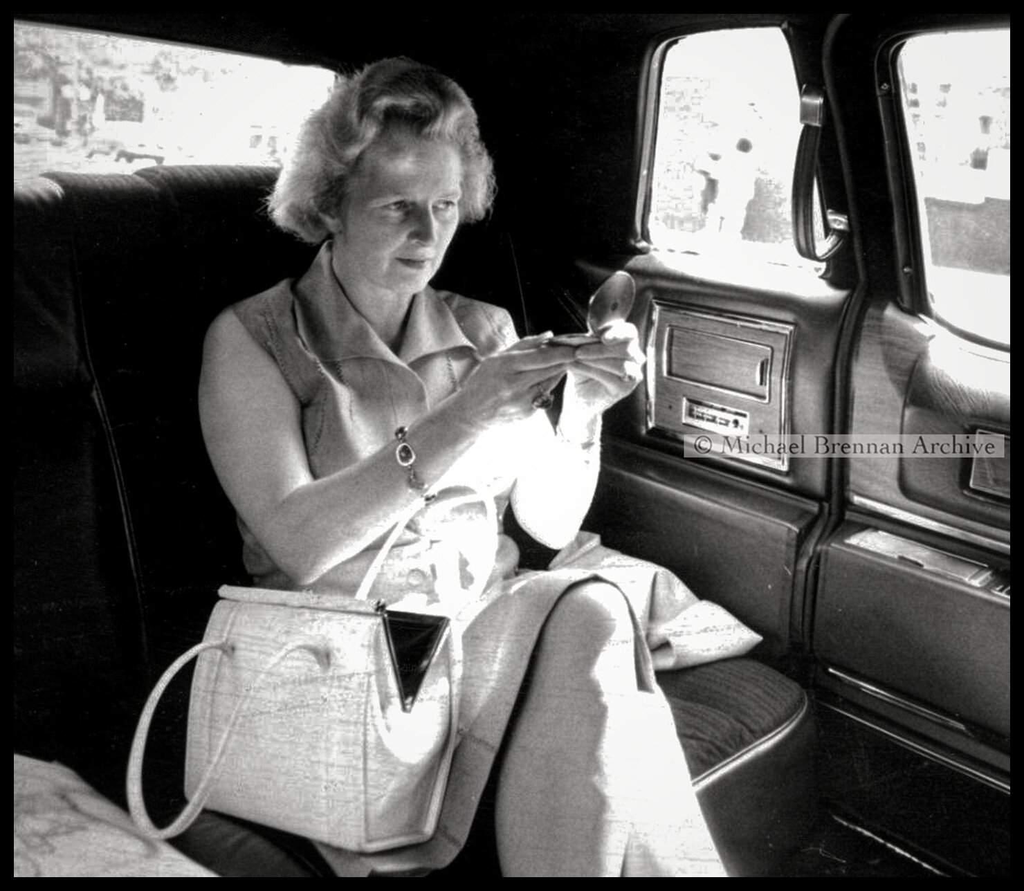 Margaret Thatcher Checking Her Appearance in Limousine — Washington, D.C. · Sep 22, 1975