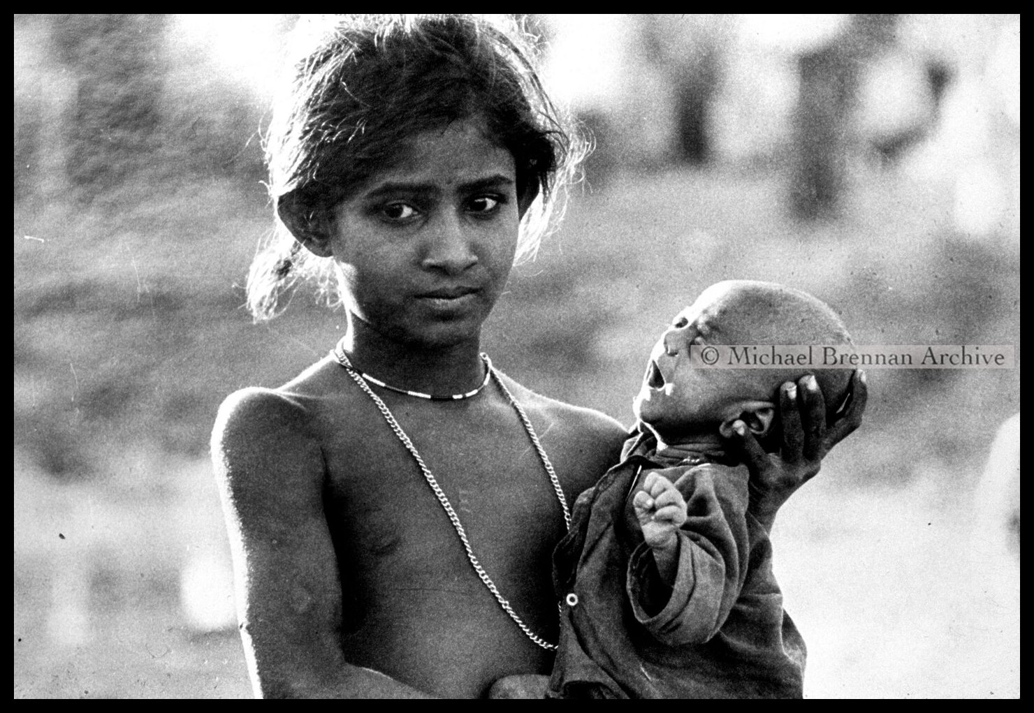 Girl and Newborn at Refugee Camp — Krishnanagar · Dec 1971