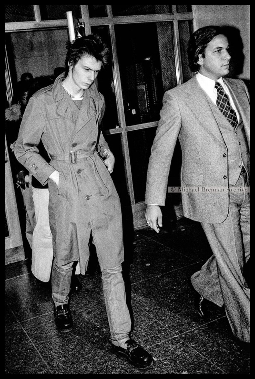 Sid Vicious Leaving Court with Lawyer — New York City · Oct 17, 1978