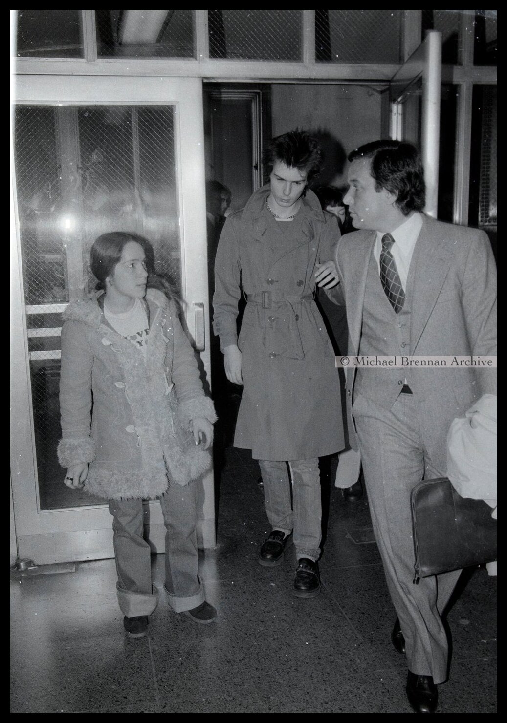 Sid Vicious Leaving Court with Lawyer — New York City · Oct 17, 1978